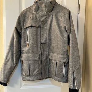 Gray Bonfire snowboarding/ski jacket with herringbone pattern.